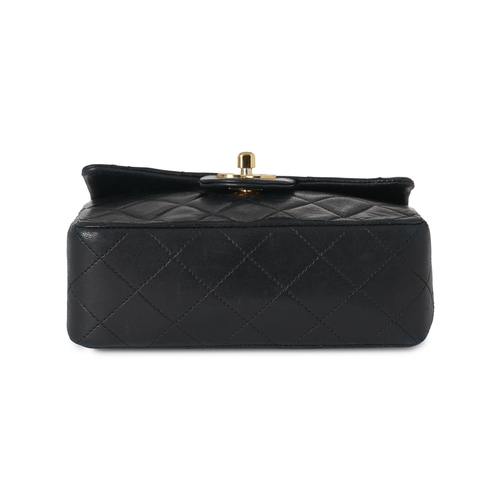 275 - Chanel, a vintage Mini Square Classic Flap handbag, crafted from black lambskin leather, with diamon... 