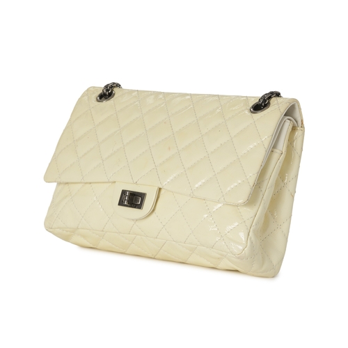 277 - Chanel, a 2.55 Reissue Double Flap 226 handbag, designed with a cream patent leather exterior, antiq... 