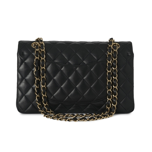 279 - Chanel, a Medium Classic Double Flap handbag, designed with a quilted black caviar leather exterior,... 
