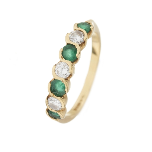 28 - An 18ct gold emerald and brilliant-cut diamond seven-stone ring, estimated total diamond weight 0.40... 