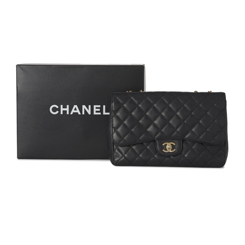 281 - Chanel, a Jumbo Classic Flap handbag, featuring a black caviar quilted leather exterior, with gold-t... 
