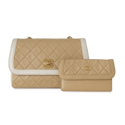 282 - Chanel, a vintage Diana Flap handbag with purse, crafted from black quilted cream leather, with whit... 