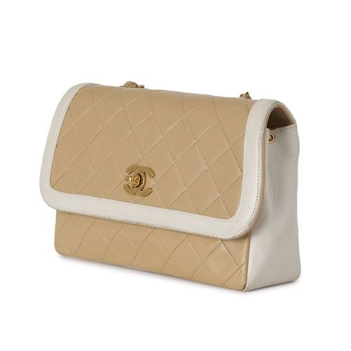 282 - Chanel, a vintage Diana Flap handbag with purse, crafted from black quilted cream leather, with whit... 