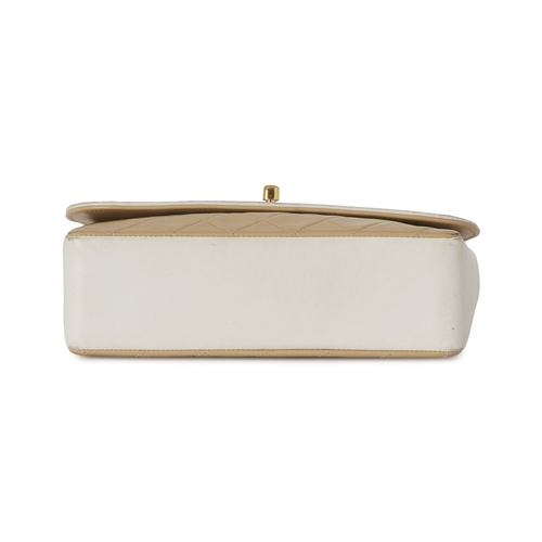 282 - Chanel, a vintage Diana Flap handbag with purse, crafted from black quilted cream leather, with whit... 