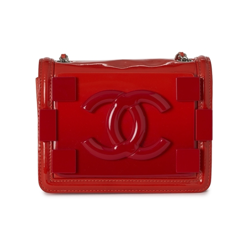 286 - Chanel, a Boy Brick Flap handbag, featuring an orange patent leather exterior with a pink and orange... 