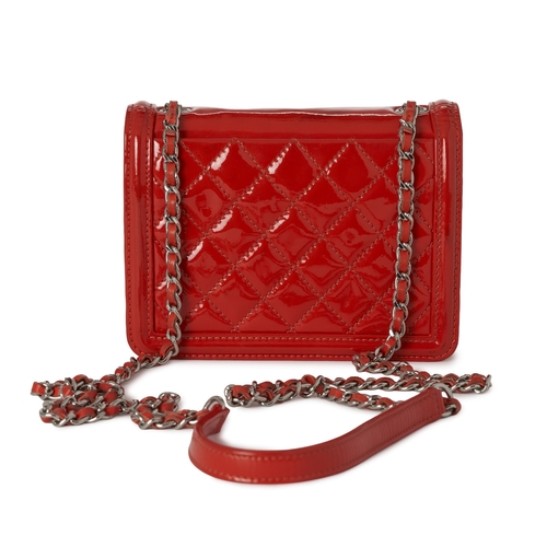 286 - Chanel, a Boy Brick Flap handbag, featuring an orange patent leather exterior with a pink and orange... 