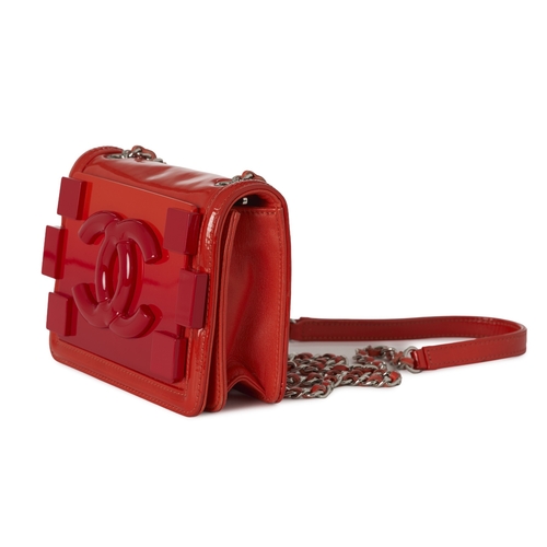 286 - Chanel, a Boy Brick Flap handbag, featuring an orange patent leather exterior with a pink and orange... 