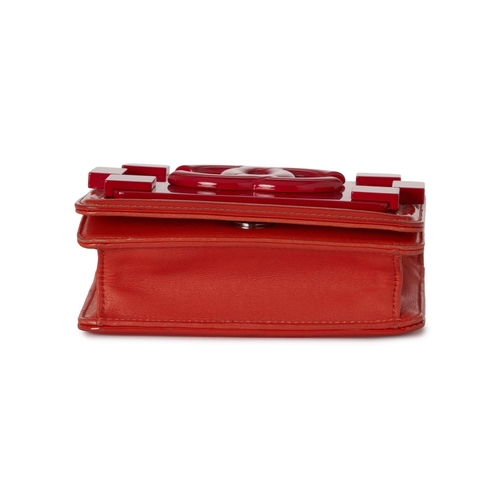 286 - Chanel, a Boy Brick Flap handbag, featuring an orange patent leather exterior with a pink and orange... 