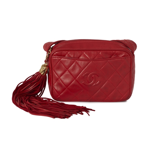 289 - Chanel, a vintage Tassel Camera bag, designed with a red quilted lambskin leather exterior, featurin... 