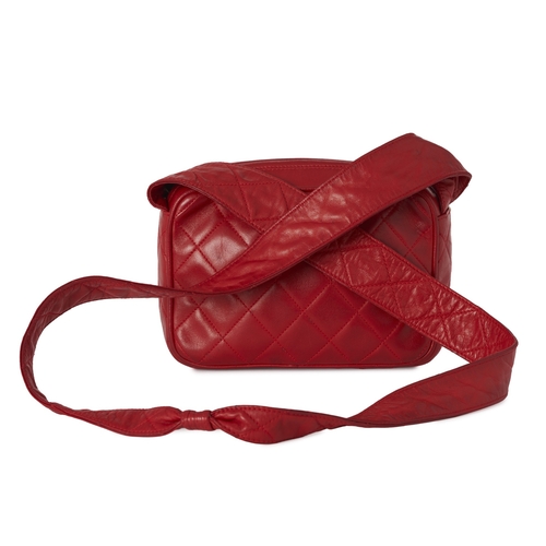 289 - Chanel, a vintage Tassel Camera bag, designed with a red quilted lambskin leather exterior, featurin... 