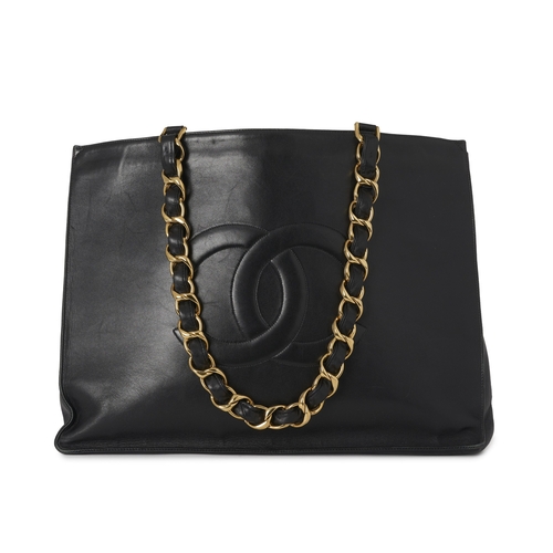292 - Chanel, a vintage Jumbo XL Chain Shopping Tote, crafted from smooth black calfskin leather with stit... 