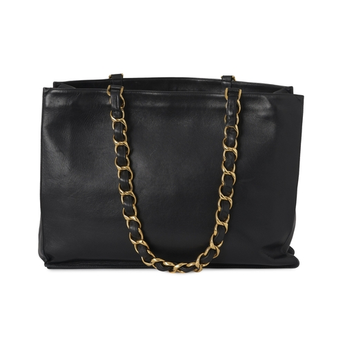 292 - Chanel, a vintage Jumbo XL Chain Shopping Tote, crafted from smooth black calfskin leather with stit... 