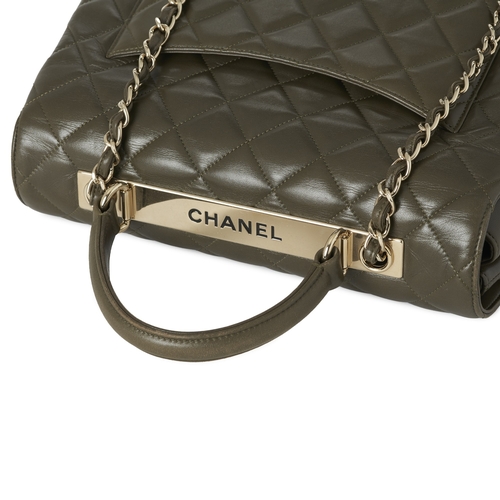 294 - Chanel, a Trendy CC Top Handle handbag, crafted from green quilted lambskin leather with gold-tone h... 