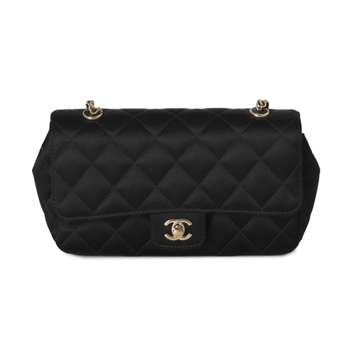 297 - Chanel, a satin Mini Flap handbag, crafted from quilted black satin, with gold-tone hardware, a long... 