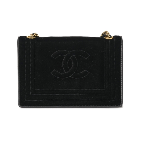 298 - Chanel, a vintage black velvet Classic Flap handbag, designed with black leather trim, featuring emb... 
