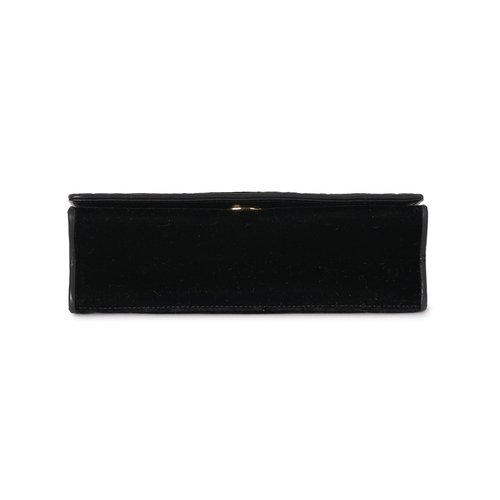 298 - Chanel, a vintage black velvet Classic Flap handbag, designed with black leather trim, featuring emb... 