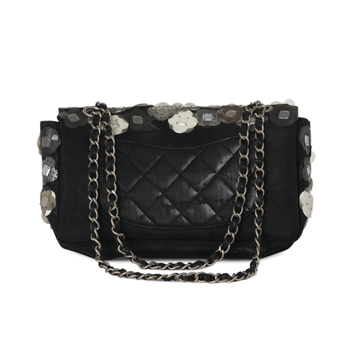 299 - Chanel, a mesh Paillette Flap handbag, featuring a black mesh exterior with floral paillette embelli... 