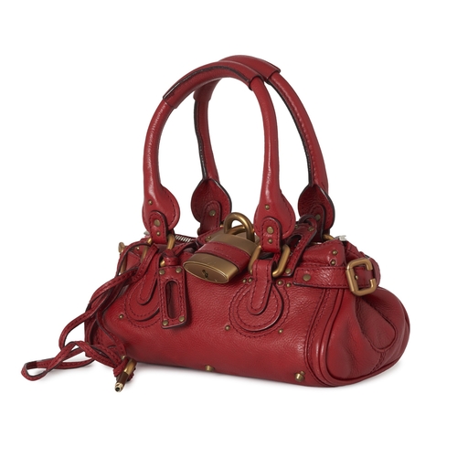 317 - Chloe, a mini Paddington handbag, featuring a grained red calfskin leather exterior, with brushed go... 
