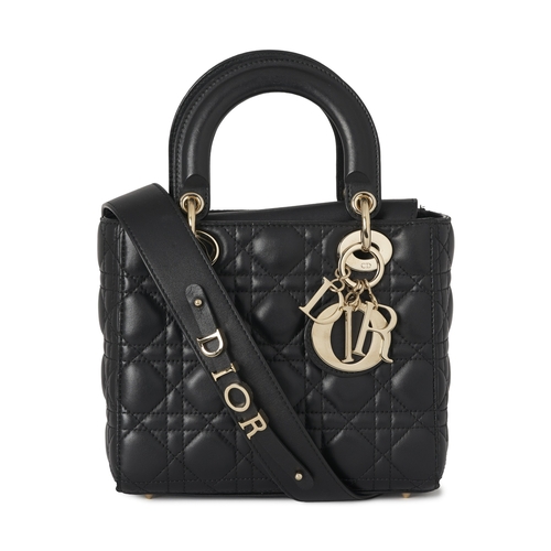 318 - Christian Dior, a small Cannage Lady Dior handbag, designed with a quilted black lambskin leather ex... 