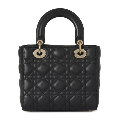 318 - Christian Dior, a small Cannage Lady Dior handbag, designed with a quilted black lambskin leather ex... 