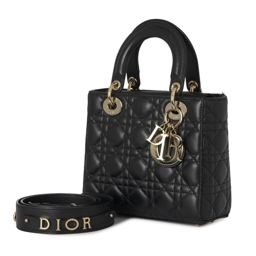 318 - Christian Dior, a small Cannage Lady Dior handbag, designed with a quilted black lambskin leather ex... 