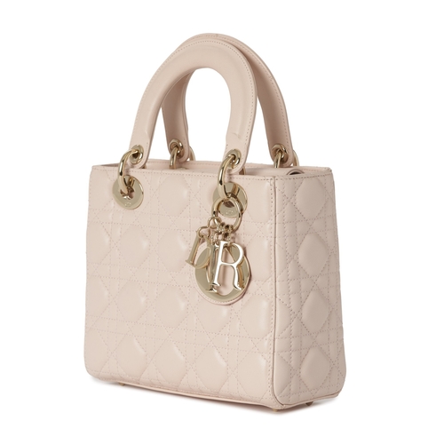 320 - Christian Dior, a small Cannage Lady Dior handbag, designed with a quilted pale pink lambskin leathe... 