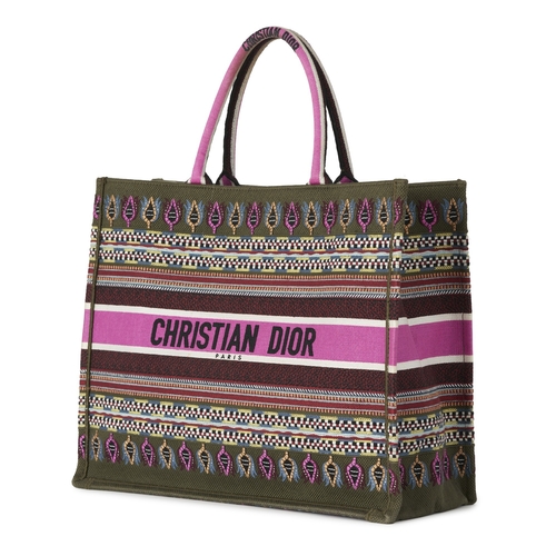 325 - Christian Dior, a large Book Tote, crafted from embroidered multicoloured canvas, with rolled handle... 