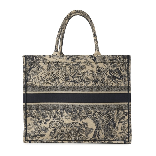 326 - Christian Dior, a large Book Tote, featuring an ecru and blue Toile de Jouy embroidered motif, with ... 