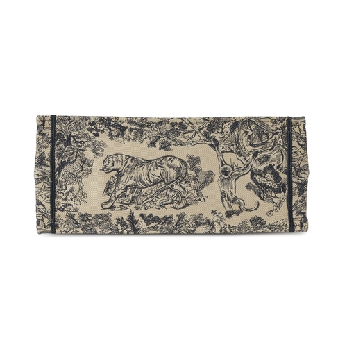 326 - Christian Dior, a large Book Tote, featuring an ecru and blue Toile de Jouy embroidered motif, with ... 