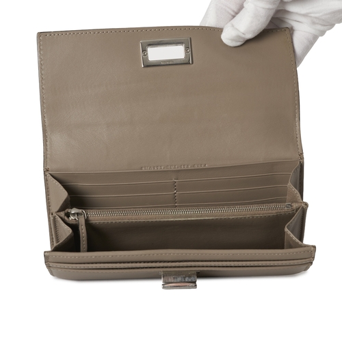 348 - Fendi, a Peekaboo continental long wallet, crafted from smooth taupe leather, with a silver-tone tur... 