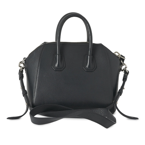 349 - Givenchy, a mini Antigona handbag, designed with a grained black leather exterior, with a triangular... 