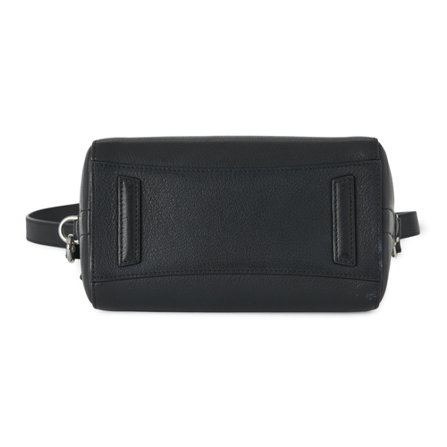 349 - Givenchy, a mini Antigona handbag, designed with a grained black leather exterior, with a triangular... 
