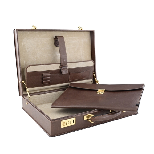 355 - Gucci, a vintage leather briefcase, designed with a brown leather exterior, gold-tone hardware, comb... 
