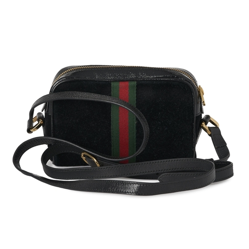 356 - Gucci, an Ophidia camera bag, designed with a black suede exterior and black patent leather trim, fe... 