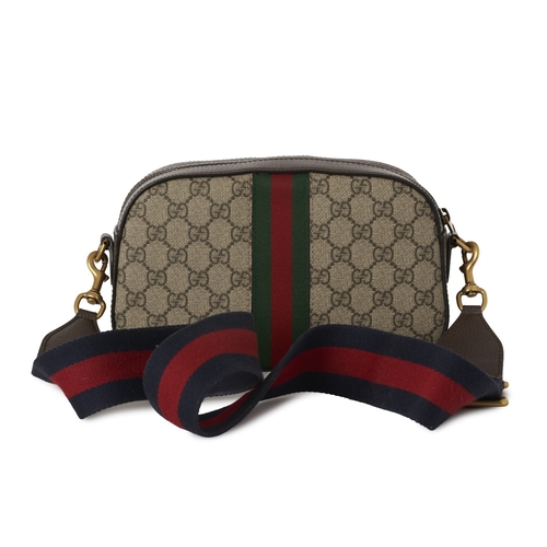 357 - Gucci, a Supreme Ophidia camera bag, crafted from GG coated canvas, with brown leather trim, green a... 