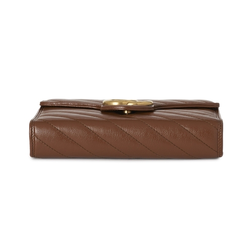 359 - Gucci, a brown leather Marmont chain clutch, designed with a diagonal quilted leather exterior, with... 