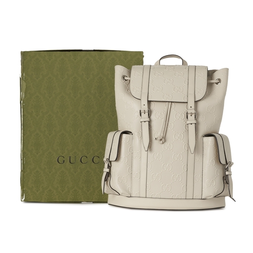 364 - Gucci, a GG embossed leather backpack, crafted from off-white GG embossed leather, with silver-tone ... 