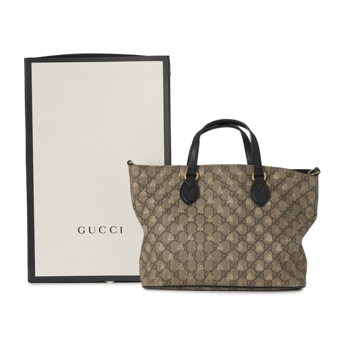 366 - Gucci, a GG Supreme Bee tote, crafted from GG coated canvas with overlayed gold bee motif and black ... 