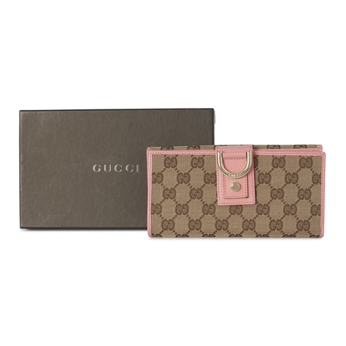376 - Gucci, an Abbey long wallet, designed with the maker's classic GG monogram canvas exterior, with pin... 
