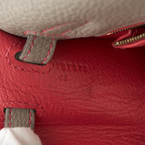384 - Hermes, a HSS special order 2020 Kelly Sellier 25 handbag, crafted from grey leather with contrastin... 