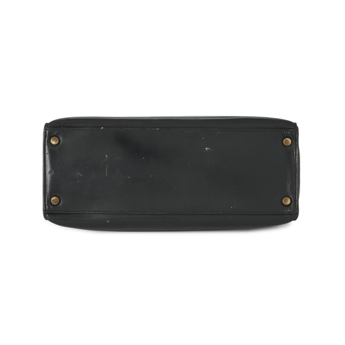 387 - Hermes, a vintage 1956 Kelly Seller 28 handbag, crafted from box calf leather, with gold-plated hard... 