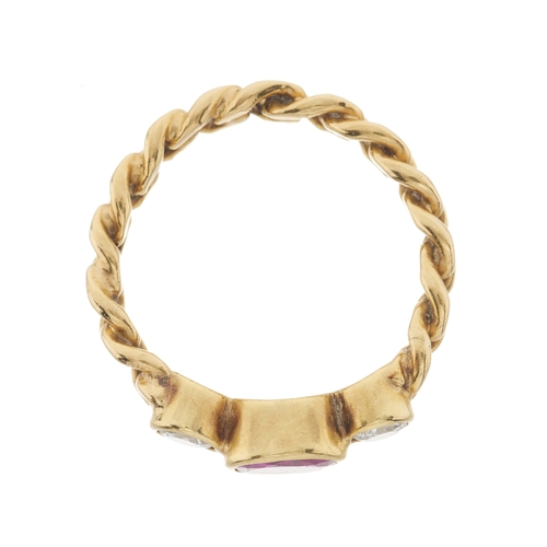 39 - An 18ct gold ruby and brilliant-cut diamond three-stone ring, with flat curb-link band, estimated to... 