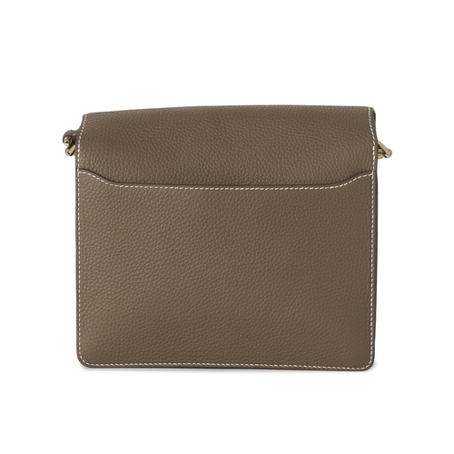 390 - Hermes, a 2022 Roulis 23 handbag, crafted from Etoupe taupe leather, with Palladium-plated hardware,... 
