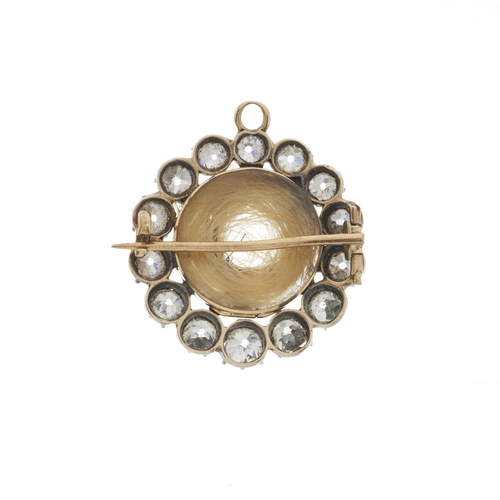 4 - A Georgian silver and gold old-cut diamond mourning brooch, with central glazed hairwork panel, esti... 