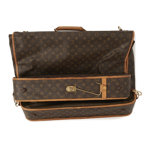 421 - Louis Vuitton, a large monogram garment bag w/ two garment covers, designed with a coated monogram c... 