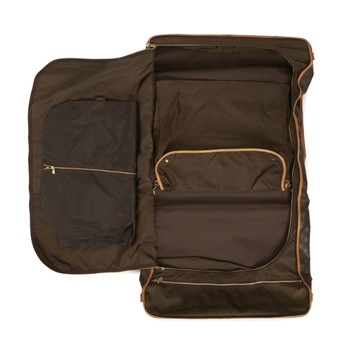 421 - Louis Vuitton, a large monogram garment bag w/ two garment covers, designed with a coated monogram c... 