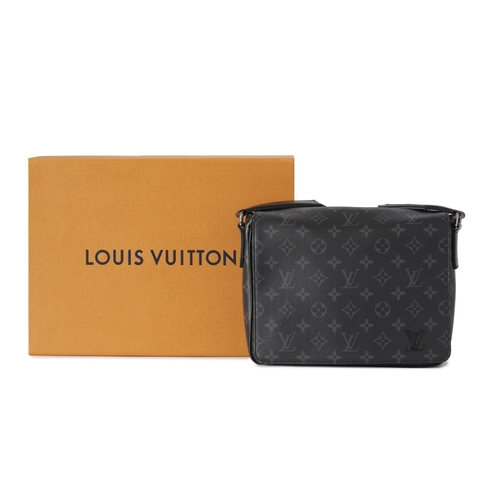 423 - Louis Vuitton, a monogram eclipse District PM messenger bag, designed with a black and grey monogram... 