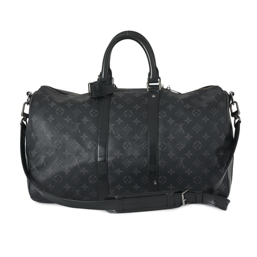 427 - Louis Vuitton, a monogram eclipse Keepall Bandouliere 45 luggage bag, crafted from black and grey mo... 