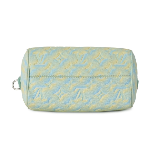 432 - Louis Vuitton, a limited edition monogram empreinte Stardust Speedy Bandouliere 20 handbag, featurin... 