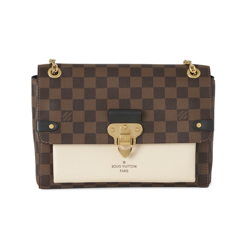 447 - Louis Vuitton, a damier ebene Vavin PM handbag, featuring a cream leather front pocket, gold-tone ha... 